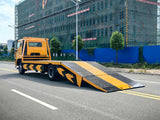 Sinotruk Howo NX flatbed tow truck