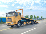Sinotruk Howo NX flatbed tow truck