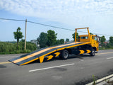 Sinotruk Howo NX flatbed tow truck
