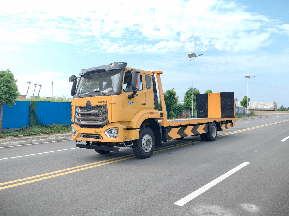 Sinotruk Howo NX flatbed tow truck